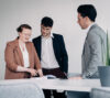 FEV Consulting, two businessmen and a businesswoman in a lively conversation, Career